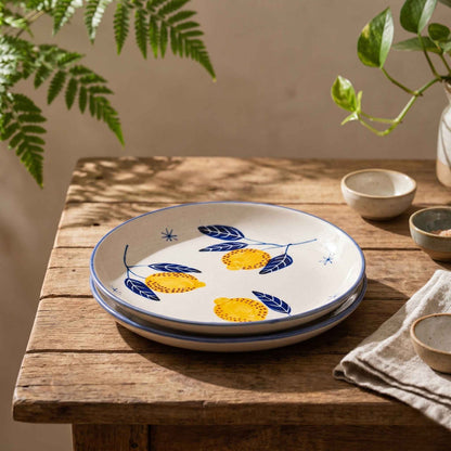 Lemon Leaf ceramic quarter plate with ivory base and blue rim