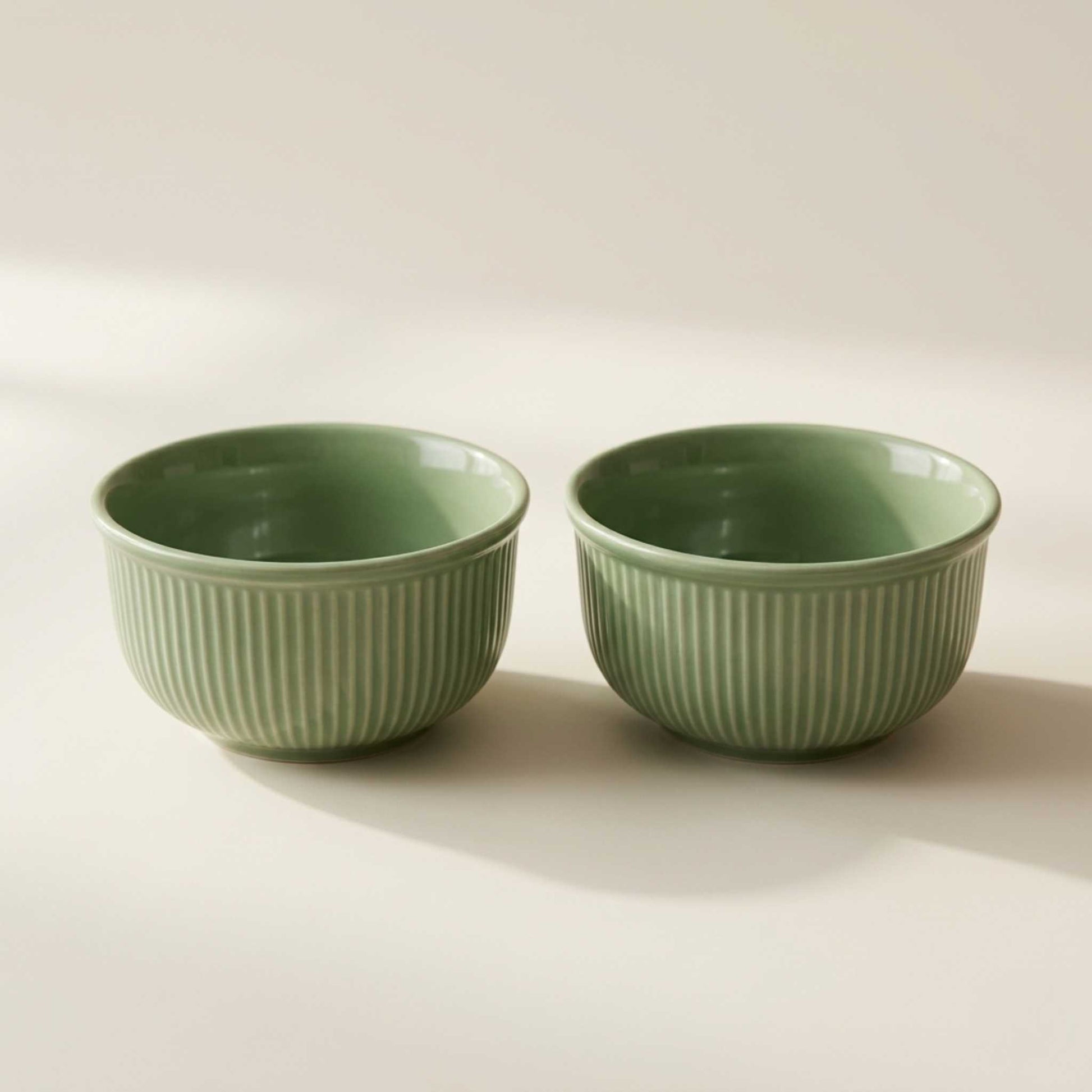textured green matte ceramic serving bowl